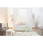 Cama con cortinas